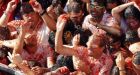 Annual tomato battle leaves Spanish town awash in red pulp